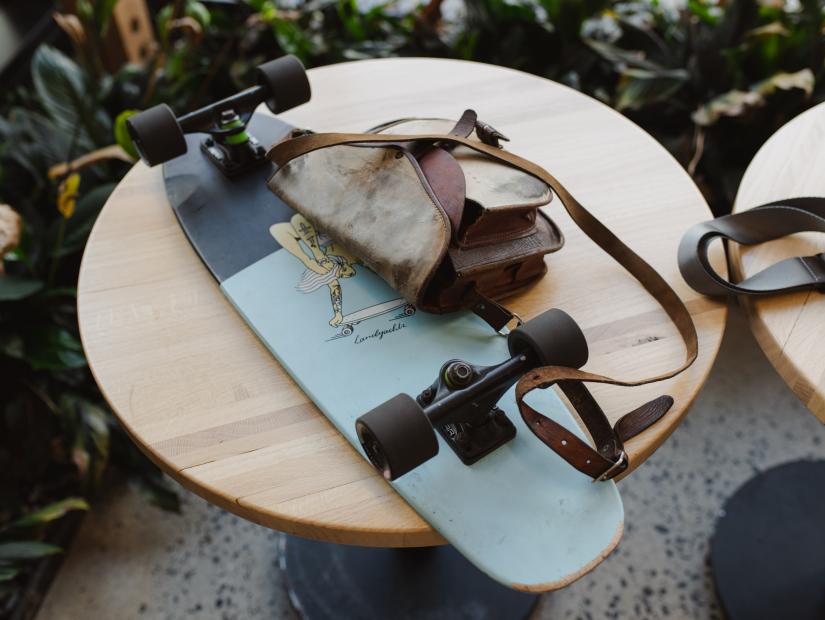 A skateboard sitting at a table
